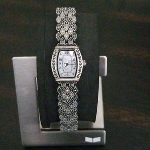 Small watch with small diamonds